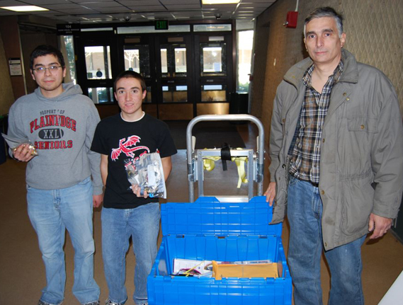 Plainedge was one of the Regional Finalists at last year's LI Regional FIRST Robotics Competition. Members of the Plainedge robotics team are pictured displaying the contents of the kit of parts with their mentor